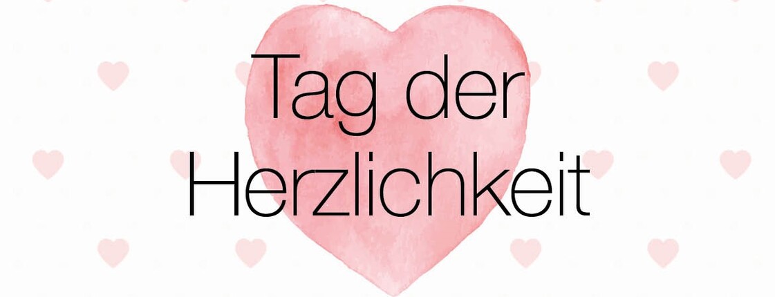Eine Grafik zeigt ein großes, rotes Herz. Darüber steht geschrieben: "Tag der Herzlichkeit".